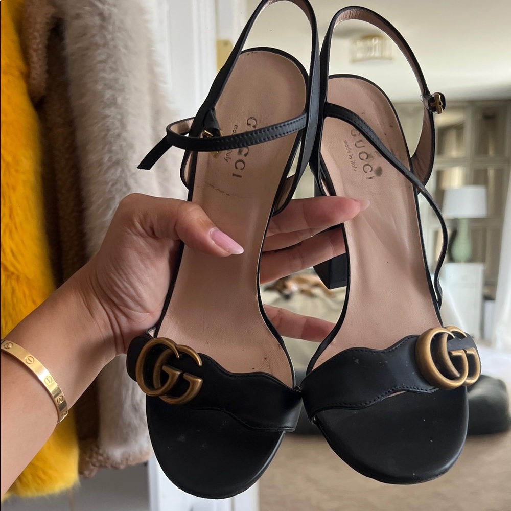 Gucci Black Heels with Gold Detailing